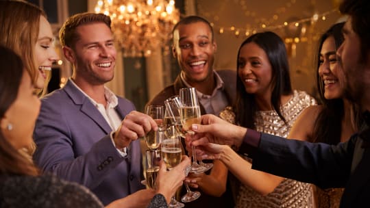 group of people celebrating New Year's Eve