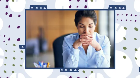 woman looking stressed at work