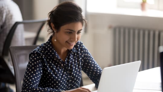 woman typing resume