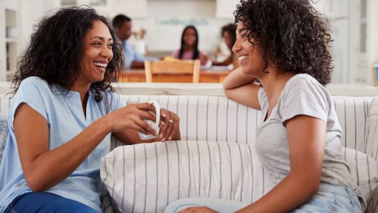 mother and daughter laughing