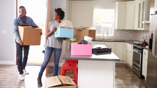 Couple moving into apartment