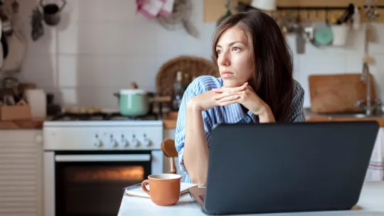 Woman upset in kitchen