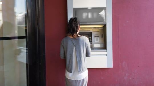 Woman at ATM