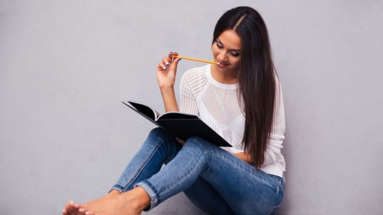 woman making a list of transferable skills