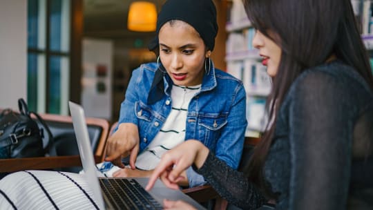 two women working