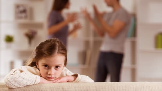 daughter listening to parents fight