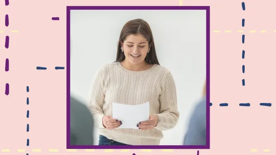 a woman giving a speech at work