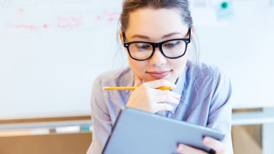 product manager working on tablet
