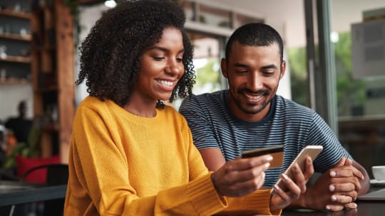 Woman and man online shopping