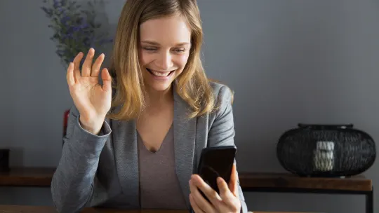 woman recording interview answers with phone