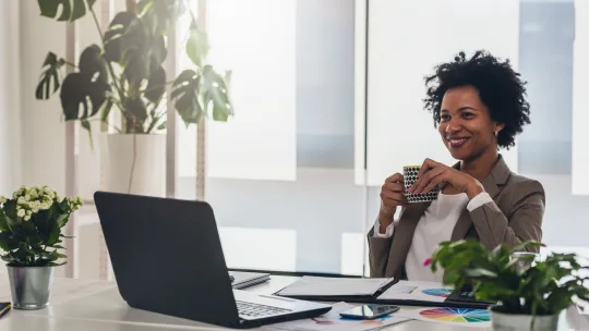 white-collar worker sitting in her office