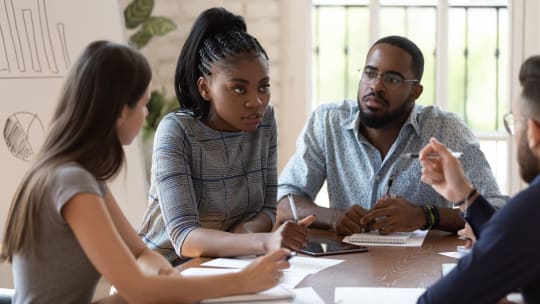 Woman speaking in meeting
