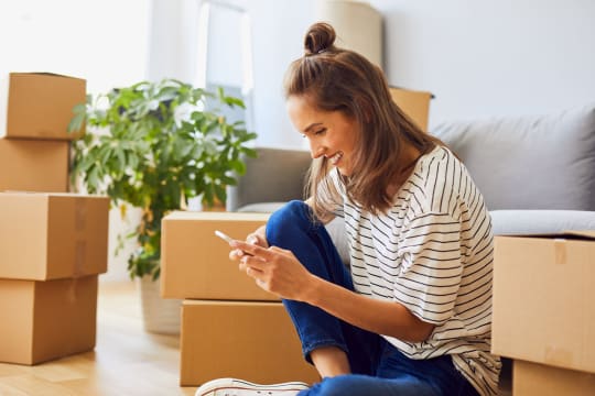 Woman with moving boxes