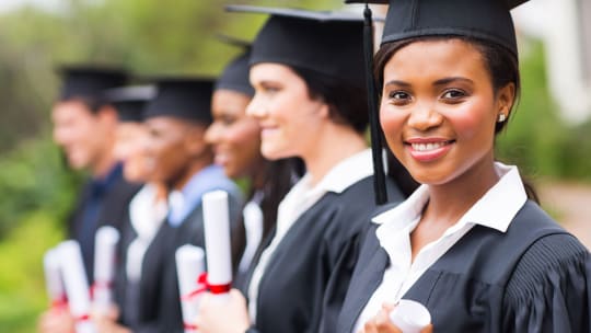 line of graduates