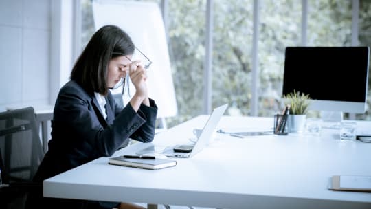 Sad woman at work