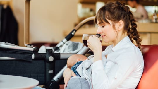 Mom eating with baby