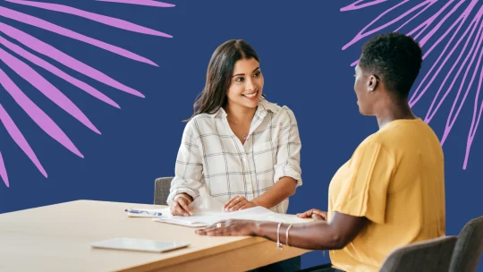 a woman interviewing another woman