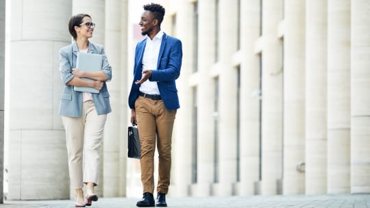 man and woman walking