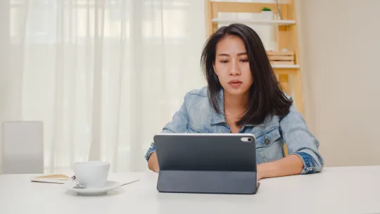 Woman working on tablet