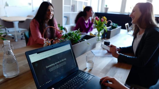 women working at a coworking place