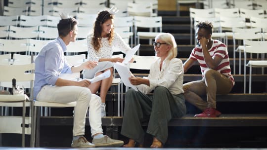 dramaturg reading script with other theatre professionals