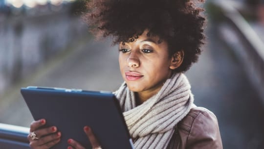 Woman working on tablet