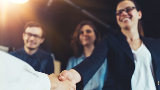 Woman shaking hands
