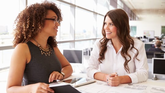 Women talking at work