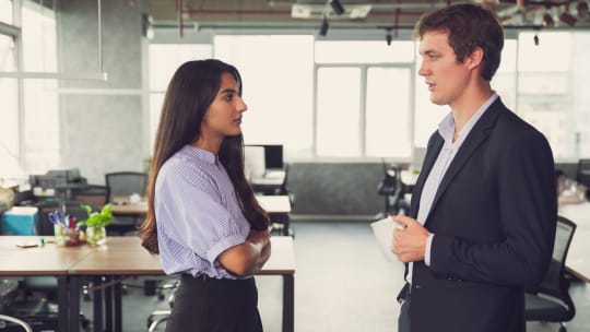 Woman looking at colleague