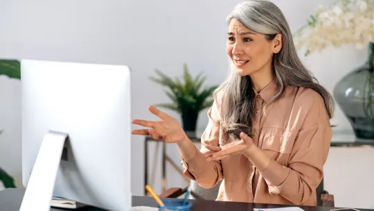 Frustrated woman on call