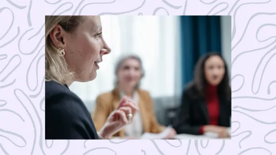 woman speaking in work meeting