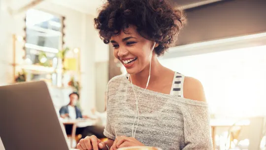 Woman investing on computer