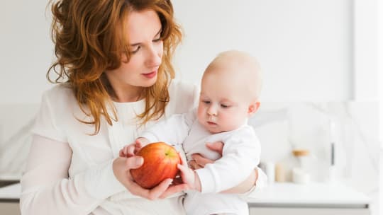 Mother watching video with children