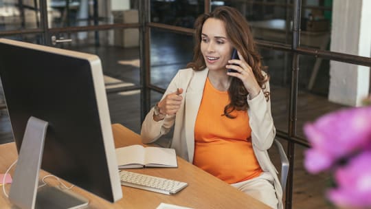 Pregnant woman working