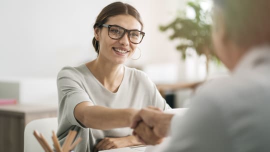 Woman shaking hands