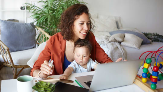 woman with laptop and coffee cup