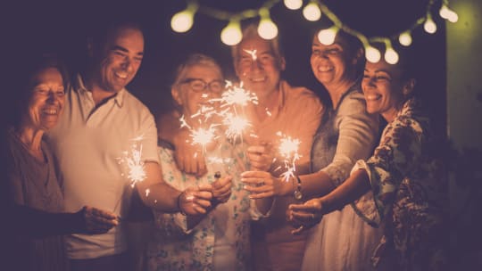 family celebrating New Year's Eve