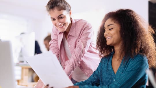 Two women at work