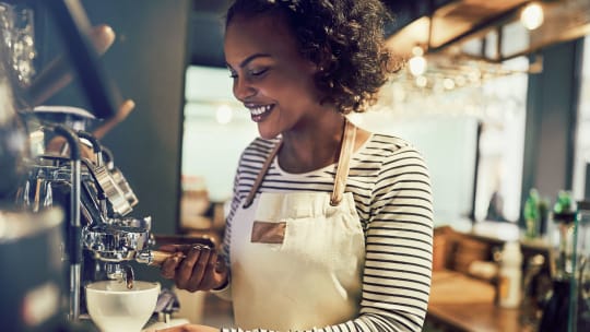 barista making coffee