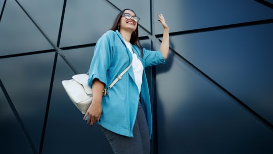 woman in office fashionable clothes