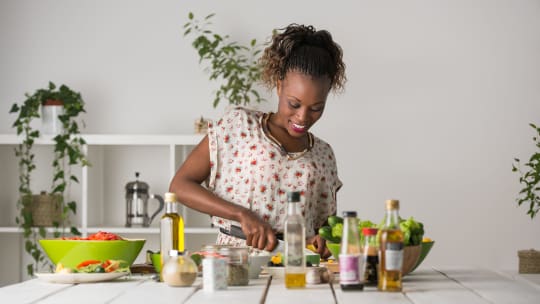 woman cooking vegan lunch