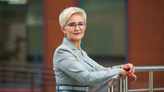 beautiful stylish woman with a short haircut in a suit