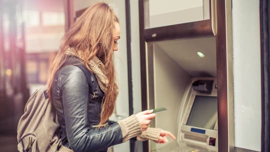 Woman at ATM
