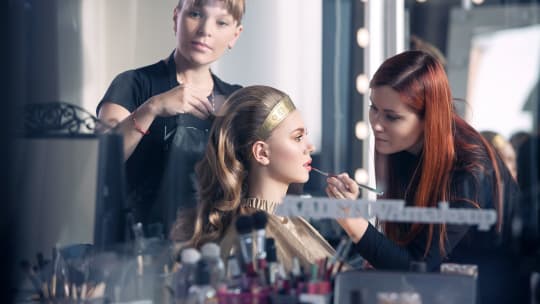 Woman getting her makeup done