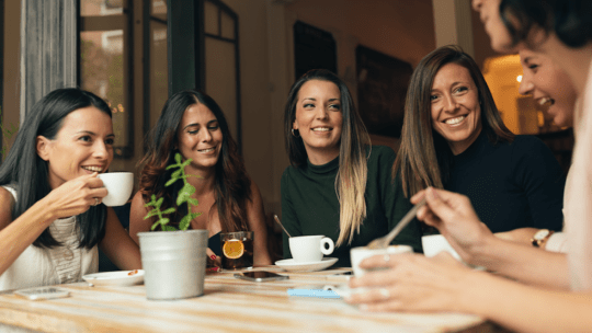 Young women drinking coffee