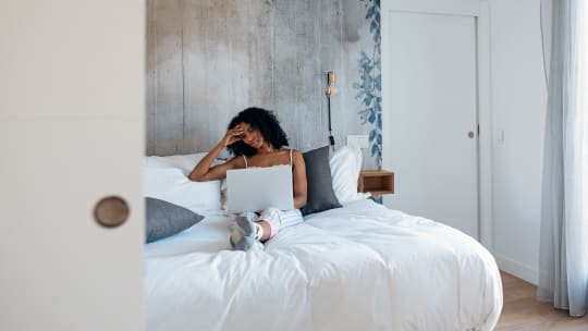 Woman typing on computer
