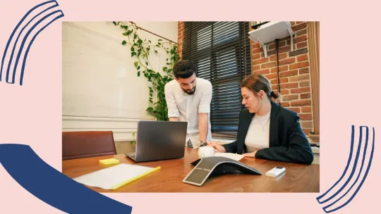 two people having a conversation at work
