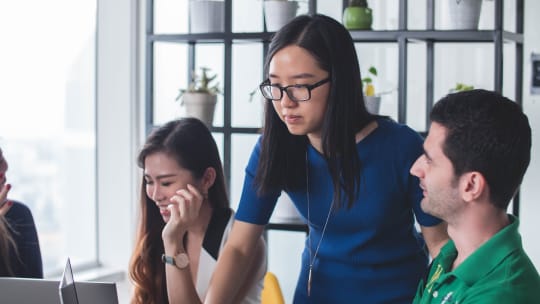 Cross-functional team working together on a project
