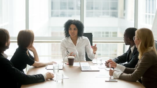 manager leading meeting