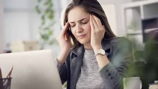 Stressed woman at work